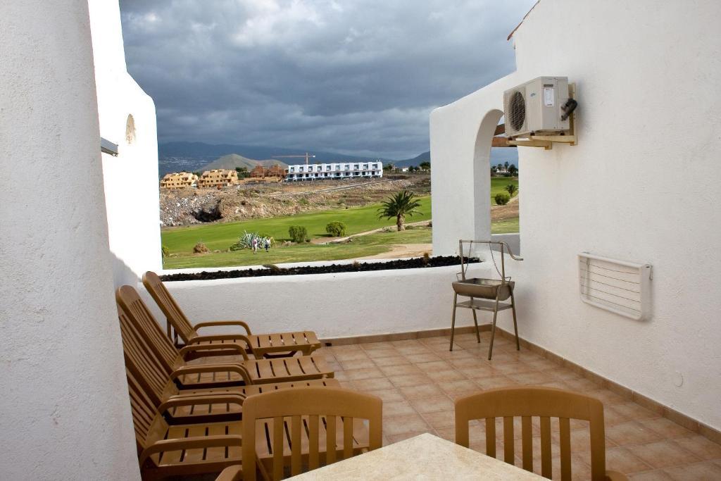 Апартаменты Fairways Club Сан Мигель Номер фото